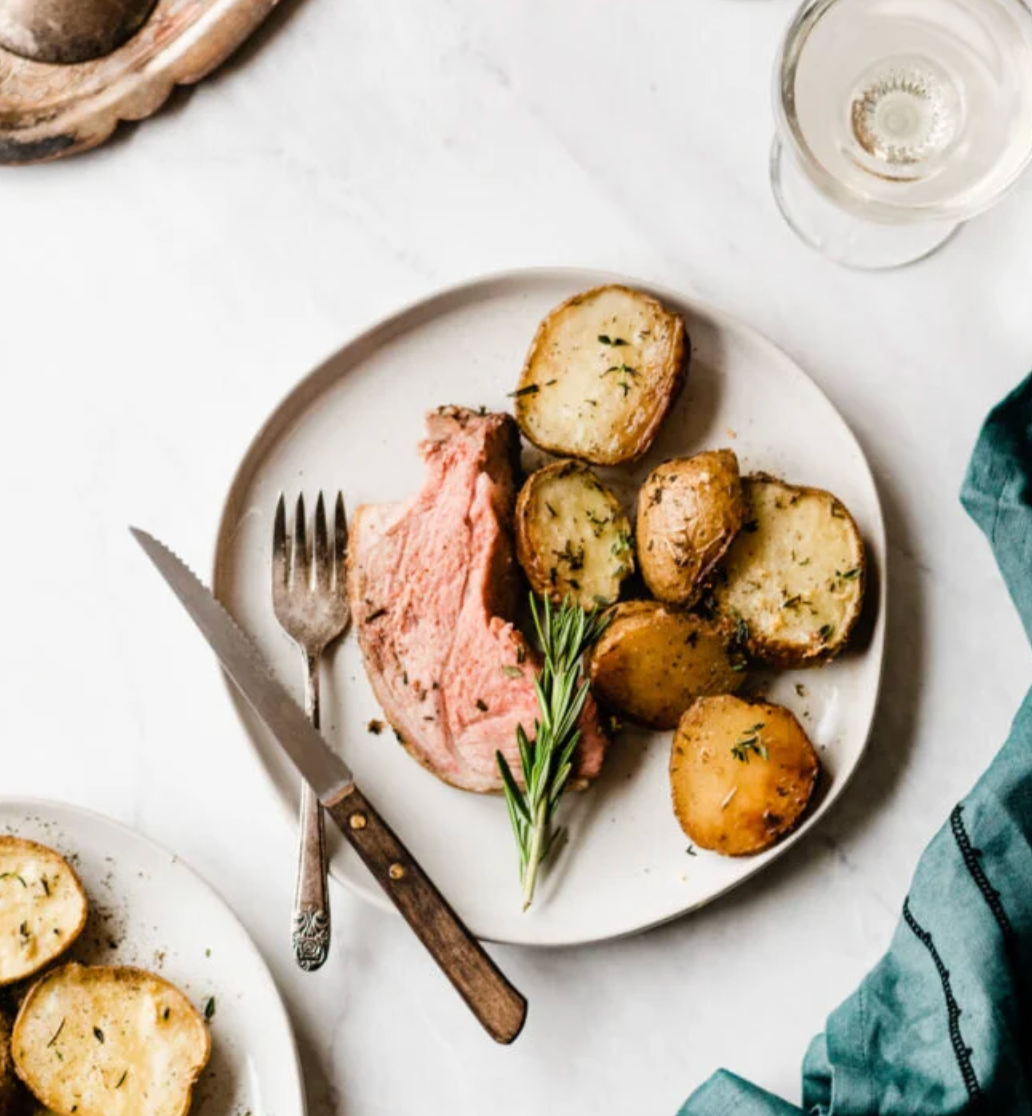 Lamb Roast with Herbed Garlic Butter Potatoes